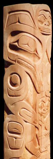 carved pole of bear mother and baby by Tlingit artist Odin Lonning